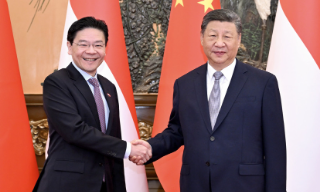 习近平晤黄循财 称欢迎新加坡续深...